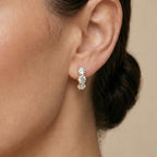 3-Stone Huggies 4mm CloseUp (AI Model) - Éclat by Oui
